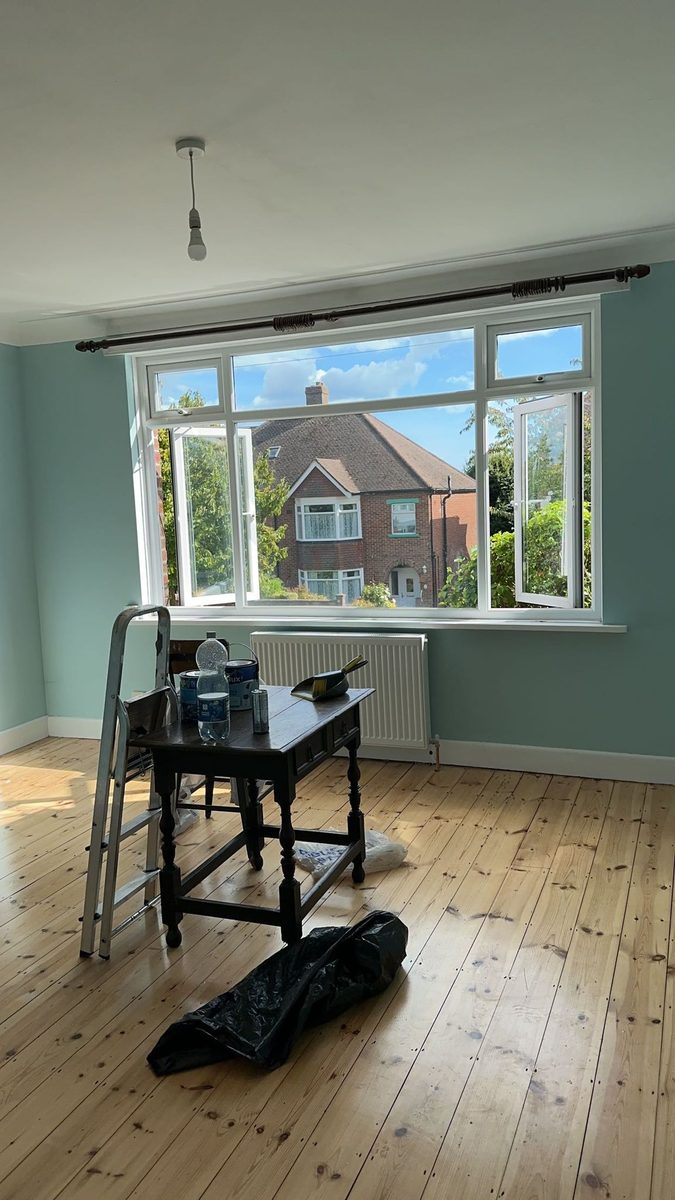 Sage green living room repaint