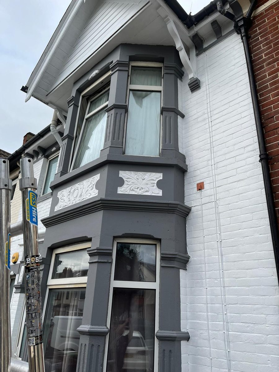 Painted Victorian bay, grey and white